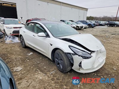Czwarte zdjęcie samochodu z boku: 2022 TESLA MODEL 3 VIN:5YJ3E1EA9NF315166 - miniatura
