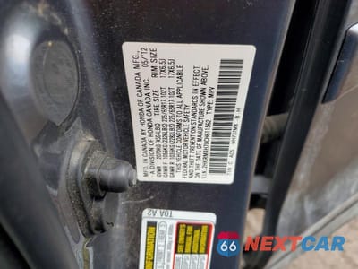 Zdjęcie 13 z 13 samochodu: 2012 HONDA CR-V EXL VIN:2HKRM4H70CH611562 - miniatura