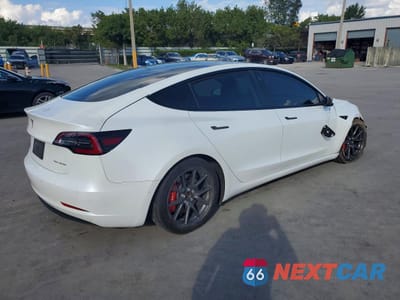 Trzecie zdjęcie samochodu z tyłu: 2022 TESLA MODEL 3 VIN:5YJ3E1EB7NF172839 - miniatura