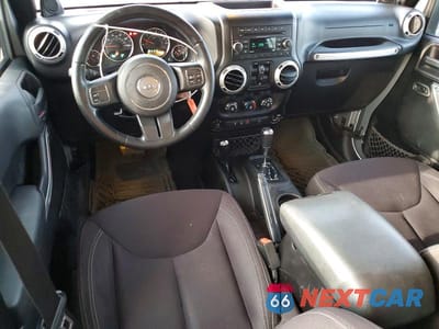 Zdjęcie 8 z 12 samochodu: 2014 JEEP WRANGLER UNLIMITED SAHARA VIN:1C4BJWEGXEL186926 - miniatura