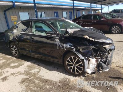 Czwarte zdjęcie samochodu z boku: 2017 VOLKSWAGEN JETTA SE VIN:3VWDB7AJ6HM209115 - miniatura