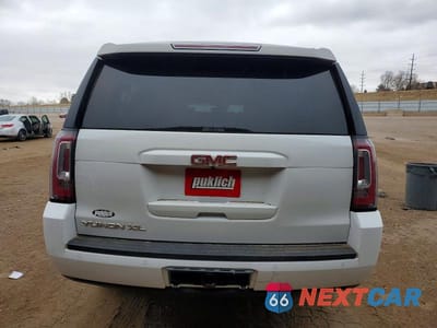 Zdjęcie 6 z 13 samochodu: 2018 GMC YUKON XL K1500 SLT VIN:1GKS2GKC1JR197667 - miniatura