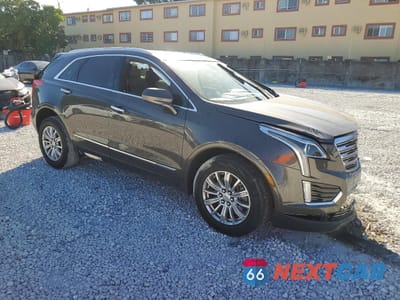 Czwarte zdjęcie samochodu z boku: 2019 CADILLAC XT5 VIN:1GYKNARS0KZ205184 - miniatura