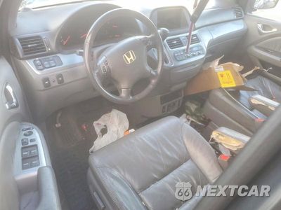 Zdjęcie 8 z 12 samochodu: 2010 HONDA ODYSSEY EXL VIN:5FNRL3H77AB069787 - miniatura