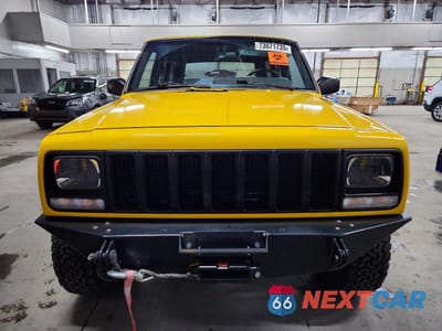 Piąte zdjęcie samochodu w środku: 2001 JEEP CHEROKEE SPORT VIN:1J4FF48S91L591011 - miniatura