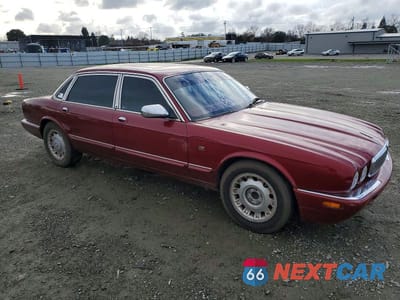 Czwarte zdjęcie samochodu z boku: 2000 JAGUAR VANDENPLAS VIN:SAJDA24C6YLF18742 - miniatura