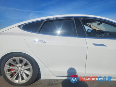 Zdjęcie 10 z 12 samochodu: 2014 TESLA MODEL S VIN:5YJSA1H17EFP37763 - miniatura