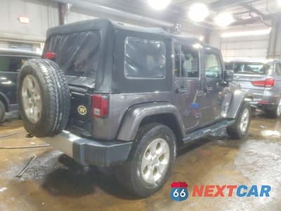 Trzecie zdjęcie samochodu z tyłu: 2014 JEEP WRANGLER UNLIMITED SAHARA VIN:1C4HJWEG0EL174181 - miniatura