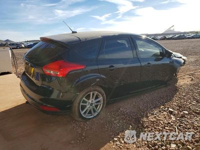 Trzecie zdjęcie samochodu z tyłu: 2017 FORD FOCUS SE VIN:1FADP3K22HL216493 - miniatura