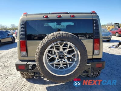Zdjęcie 6 z 12 samochodu: 2005 HUMMER H2 VIN:5GRGN23U95H126939 - miniatura