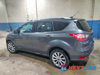 Drugie zdjęcie samochodu z przodu: 2017 FORD ESCAPE TITANIUM VIN:1FMCU0J97HUA21586 - miniatura