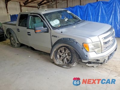 Czwarte zdjęcie samochodu z boku: 2013 FORD F150 SUPERCREW VIN:1FTFW1EF4DFA78425 - miniatura