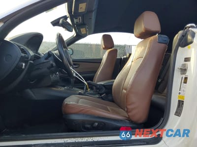 Zdjęcie 7 z 12 samochodu: 2013 BMW 128 I VIN:WBAUL7C57DVM83825 - miniatura