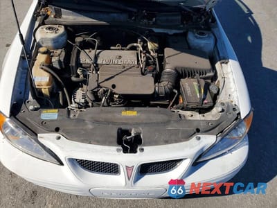 Zdjęcie 11 z 12 samochodu: 2000 PONTIAC GRAND AM SE VIN:1G2NE52TXYM879883 - miniatura