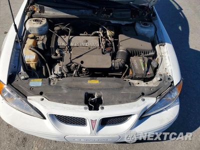Zdjęcie 11 z 12 samochodu: 2000 PONTIAC GRAND AM SE VIN:1G2NE52TXYM879883 - miniatura