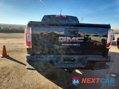 Zdjęcie 6 z 12 samochodu: 2022 GMC CANYON AT4 VIN:1GTG6FEN0N1289936 - miniatura