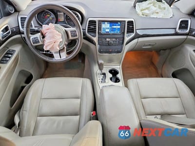 Zdjęcie 8 z 13 samochodu: 2012 JEEP GRAND CHEROKEE LAREDO VIN:1C4RJFAG3CC315459 - miniatura