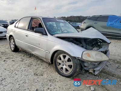 Czwarte zdjęcie samochodu z boku: 1999 HONDA CIVIC BASE VIN:2HGEJ6614XH515886 - miniatura