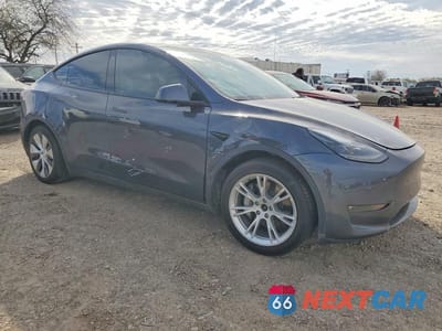 Czwarte zdjęcie samochodu z boku: 2022 TESLA MODEL Y VIN:7SAYGDEE2NF534168 - miniatura
