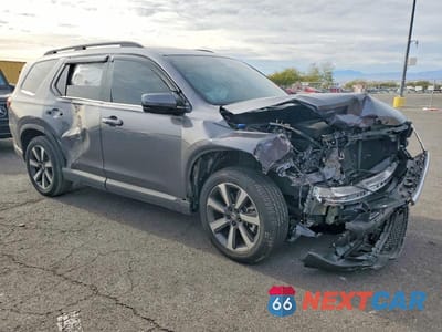 Czwarte zdjęcie samochodu z boku: 2025 HONDA PILOT TOURING VIN:5FNYG1H70SB041318 - miniatura