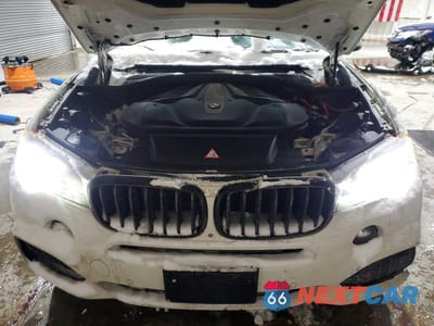 Zdjęcie 12 z 12 samochodu: 2014 BMW X5 XDRIVE50I VIN:5UXKR6C50E0C02161 - miniatura