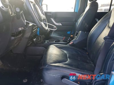 Zdjęcie 7 z 14 samochodu: 2017 JEEP WRANGLER UNLIMITED SAHARA VIN:1C4HJWEG8HL646910 - miniatura