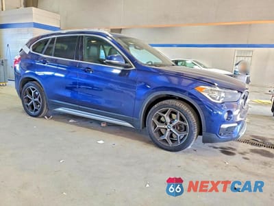 Czwarte zdjęcie samochodu z boku: 2019 BMW X1 XDRIVE28I VIN:WBXHT3C59K5L37990 - miniatura