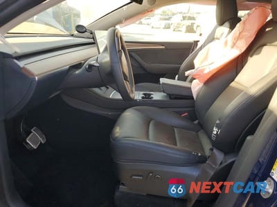 Zdjęcie 7 z 11 samochodu: 2023 TESLA MODEL Y VIN:7SAYGDEE8PF852573 - miniatura