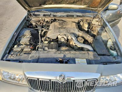 Zdjęcie 11 z 13 samochodu: 2001 MERCURY GRAND MARQUIS LS VIN:2MEFM75W21X691909 - miniatura