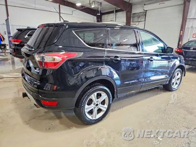 Trzecie zdjęcie samochodu z tyłu: 2017 FORD ESCAPE SE VIN:1FMCU9G97HUB51993 - miniatura