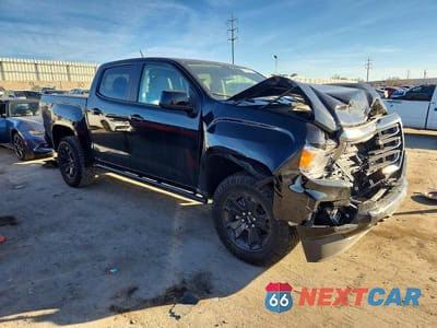 Czwarte zdjęcie samochodu z boku: 2022 GMC CANYON AT4 VIN:1GTG6FEN0N1289936 - miniatura