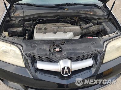 Zdjęcie 12 z 12 samochodu: 2004 ACURA MDX TOURING VIN:2HNYD18614H521410 - miniatura