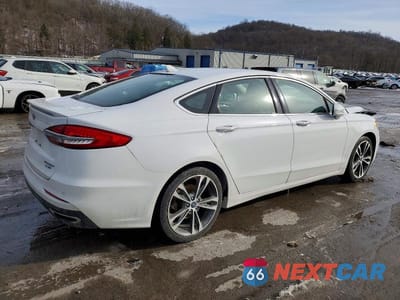 Trzecie zdjęcie samochodu z tyłu: 2020 FORD FUSION TITANIUM VIN:3FA6P0D98LR137745 - miniatura