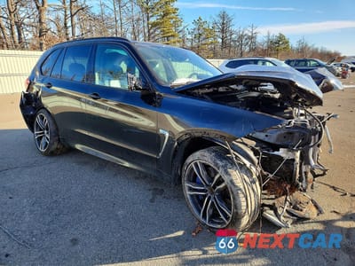 Czwarte zdjęcie samochodu z boku: 2018 BMW X5 M VIN:5YMKT6C57J0X21323 - miniatura