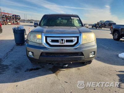 Piąte zdjęcie samochodu w środku: 2011 HONDA PILOT EXL VIN:5FNYF3H51BB028669 - miniatura