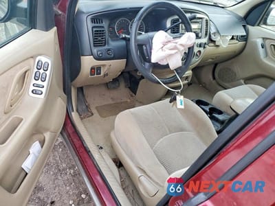 Zdjęcie 8 z 13 samochodu: 2004 MAZDA TRIBUTE LX VIN:4F2YZ04104KM03319 - miniatura