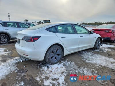Trzecie zdjęcie samochodu z tyłu: 2023 TESLA MODEL 3 VIN:5YJ3E1EA8PF554257 - miniatura