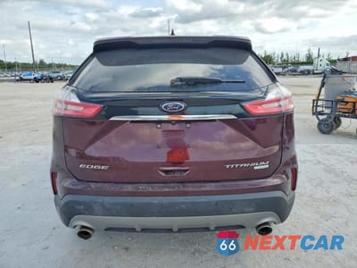 Zdjęcie 6 z 12 samochodu: 2019 FORD EDGE TITANIUM VIN:2FMPK3K90KBC15770 - miniatura
