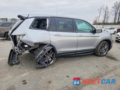 Trzecie zdjęcie samochodu z tyłu: 2023 HONDA PASSPORT EXL VIN:5FNYF8H55PB027867 - miniatura