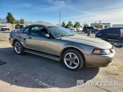 Czwarte zdjęcie samochodu z boku: 2002 FORD MUSTANG VIN:1FAFP40492F125987 - miniatura