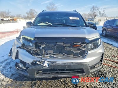 Piąte zdjęcie samochodu w środku: 2023 HONDA PASSPORT TRAIL SPORT VIN:5FNYF8H63PB009277 - miniatura