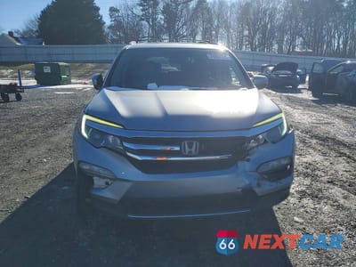 Piąte zdjęcie samochodu w środku: 2017 HONDA PILOT TOURING VIN:5FNYF6H95HB006865 - miniatura