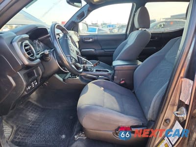 Zdjęcie 7 z 11 samochodu: 2017 TOYOTA TACOMA SR5 V6 VIN:5TFDZ5BN8HX027852 - miniatura