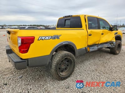 Trzecie zdjęcie samochodu z tyłu: 2016 NISSAN TITAN XD SL VIN:1N6BA1F47GN509342 - miniatura