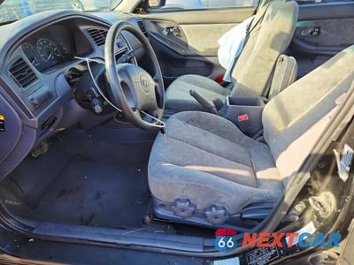 Zdjęcie 7 z 13 samochodu: 2003 HYUNDAI ELANTRA GLS VIN:KMHDN45D53U531094 - miniatura