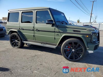 Czwarte zdjęcie samochodu z boku: 2014 MERCEDES-BENZ G 63 AMG VIN:WDCYC7DF8EX216429 - miniatura