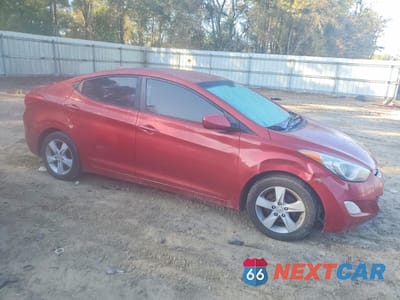 Czwarte zdjęcie samochodu z boku: 2012 HYUNDAI ELANTRA GLS VIN:KMHDH4AE7CU324972 - miniatura