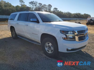 Czwarte zdjęcie samochodu z boku: 2015 CHEVROLET SUBURBAN C1500 LTZ VIN:1GNSCKKC7FR274701 - miniatura