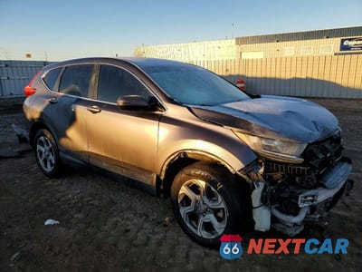 Czwarte zdjęcie samochodu z boku: 2017 HONDA CR-V EXL VIN:2HKRW2H80HH621376 - miniatura