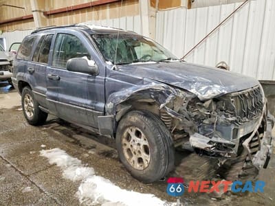 Czwarte zdjęcie samochodu z boku: 2003 JEEP GRAND CHEROKEE LAREDO VIN:1J8GW48S83C512384 - miniatura
